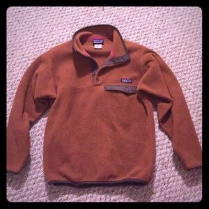 Dark orange Patagonia fleece pullover
